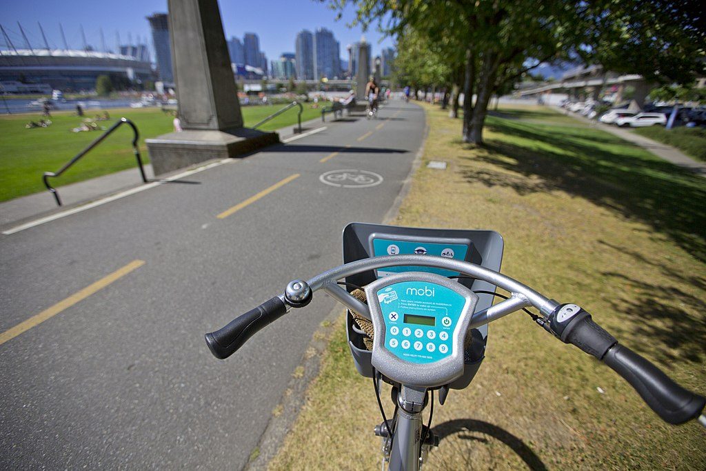 Over the handlebars of a mobi bike share bike in vancouver, BC