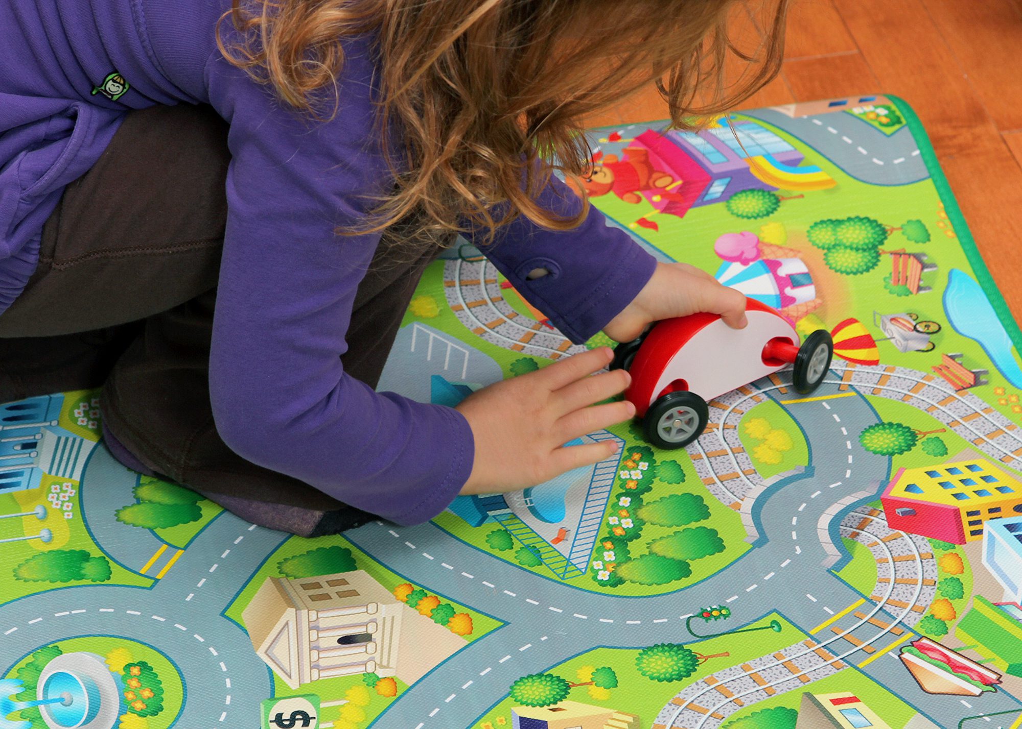 child playing with toy truck with phthalates