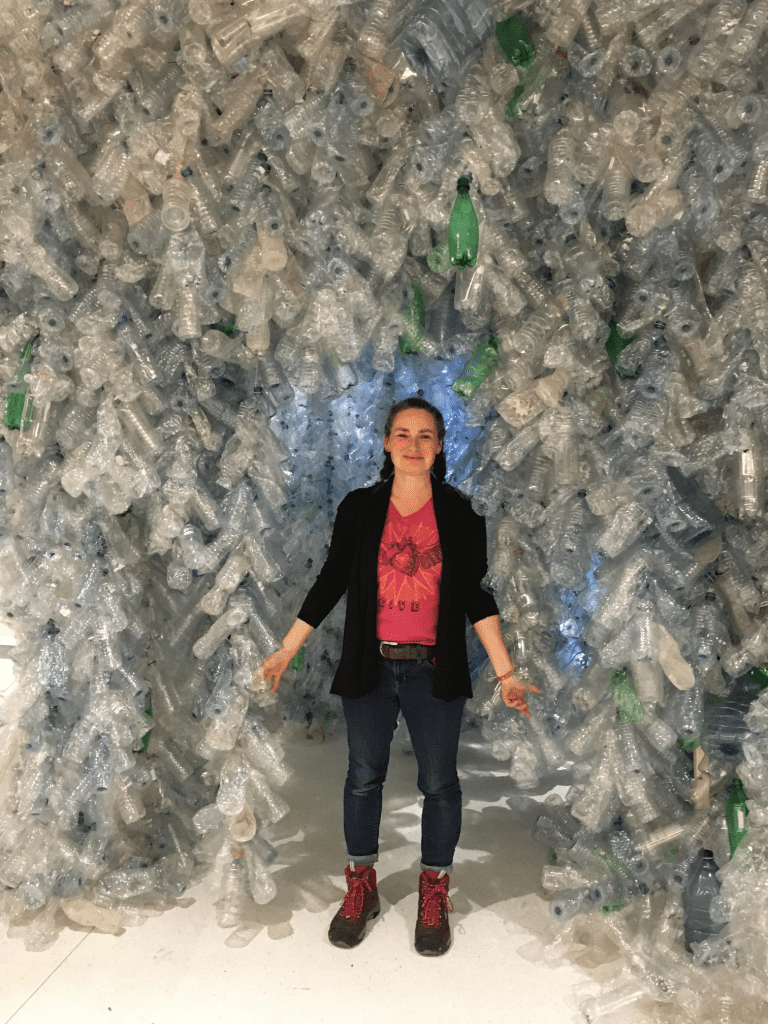 Toronto artist Rebecca Jane Houston with plastic bottle sculpture