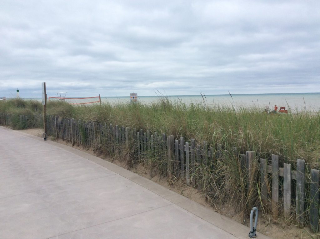 The dunes and children playing on Grand Bend Beach, ON