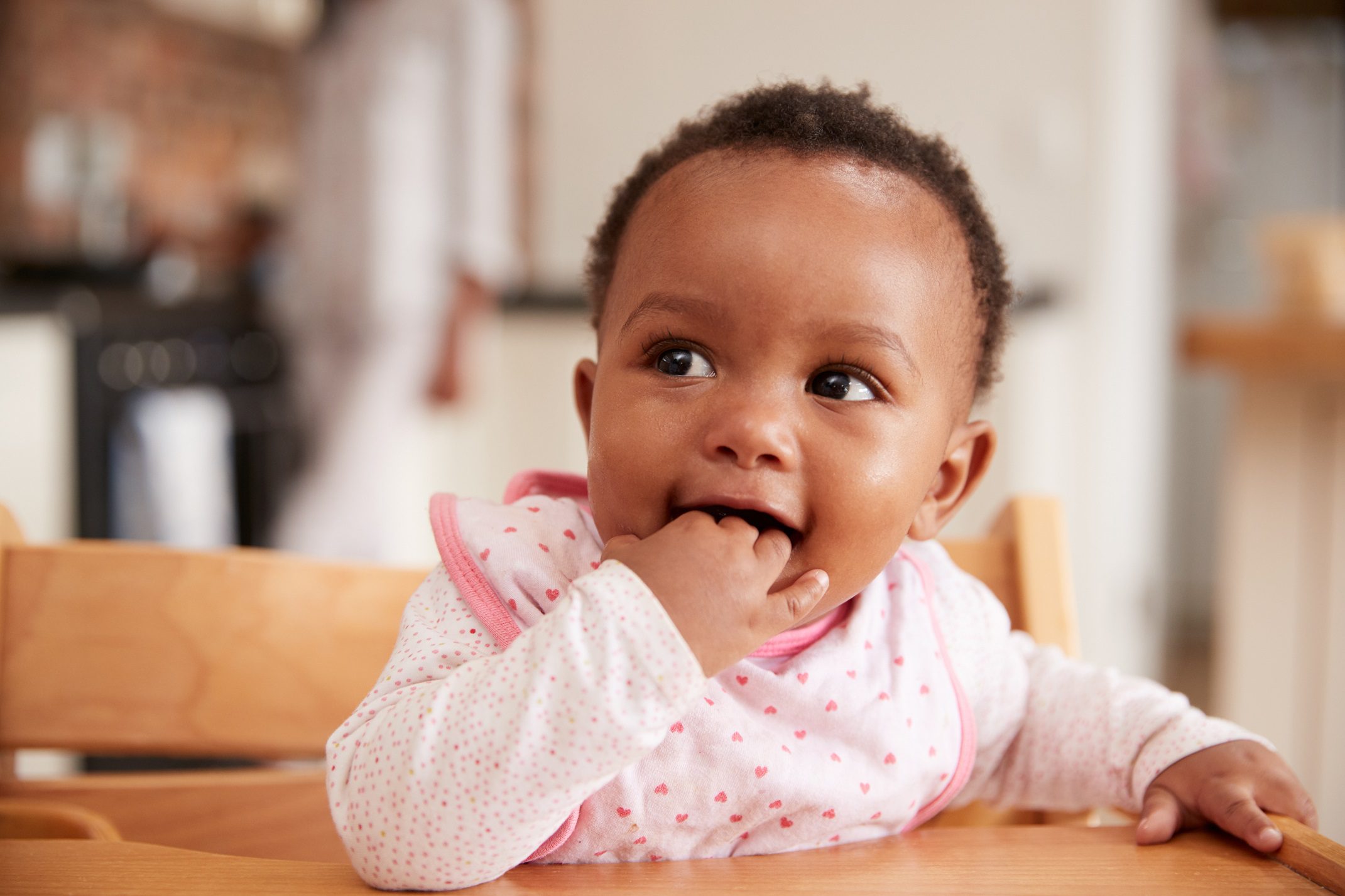 baby wearing a baby bib