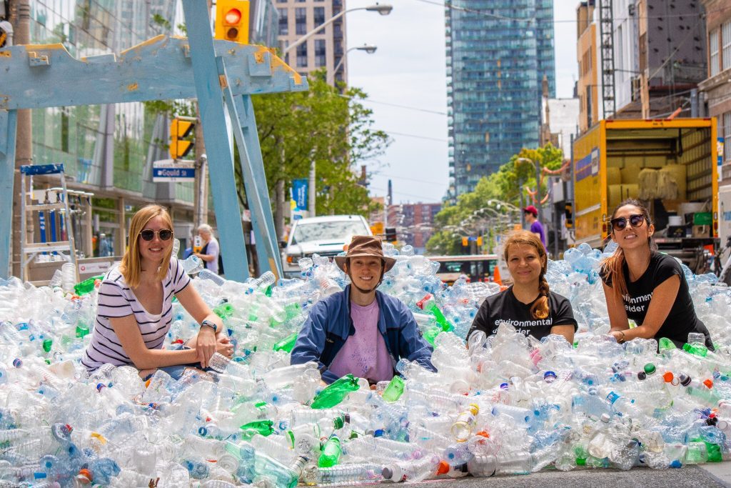 Team Water among the sea of plastic bottles