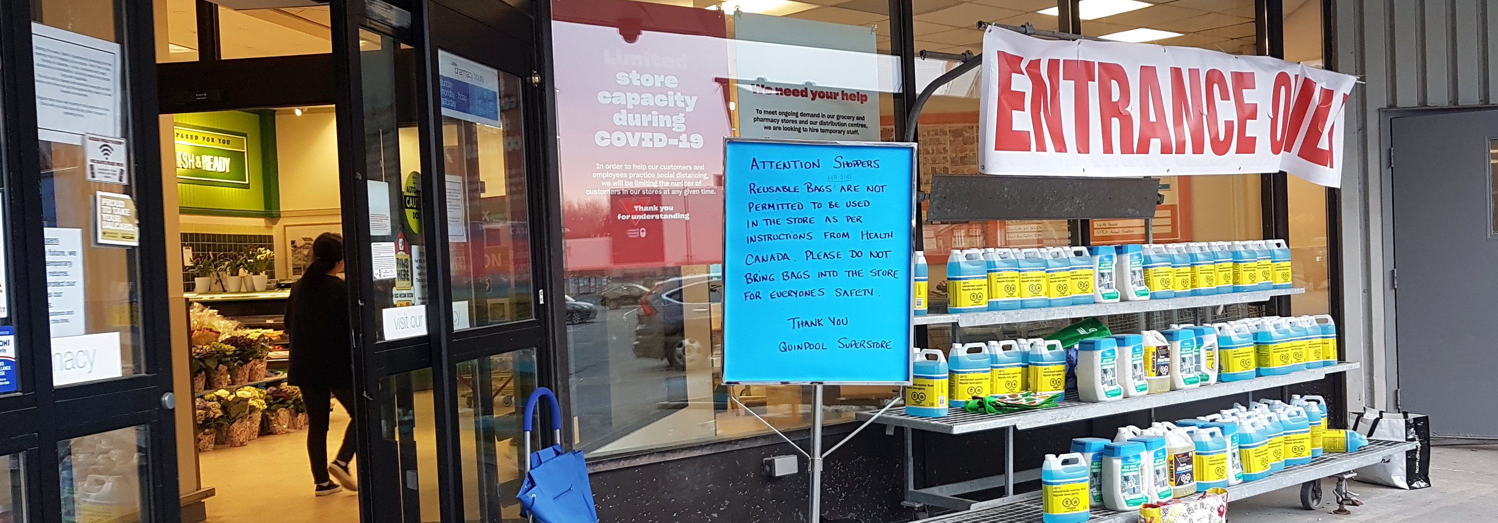 A sign in front of an Atlantic Superstore grocery store in Halifax, Nova Scotia, Canada, on April 8, 2020, is advising customers to leave reusable cotton bags outside of the store and not bring them inside for public health reasons during the coronavirus / covid-19 pandemic.