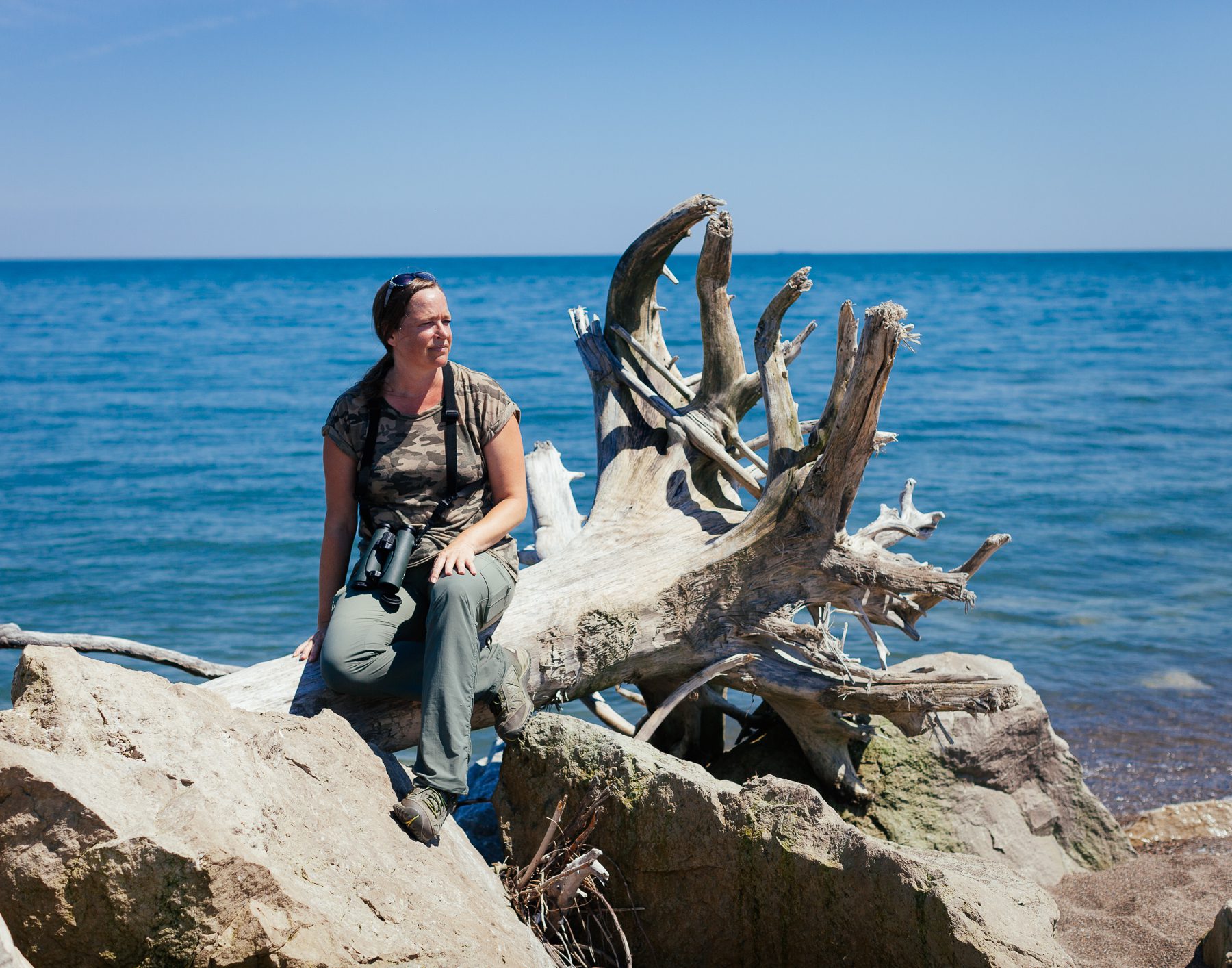 Heidi sits at the point of Point Pelee — the southernmost mainland tip of Canada. 