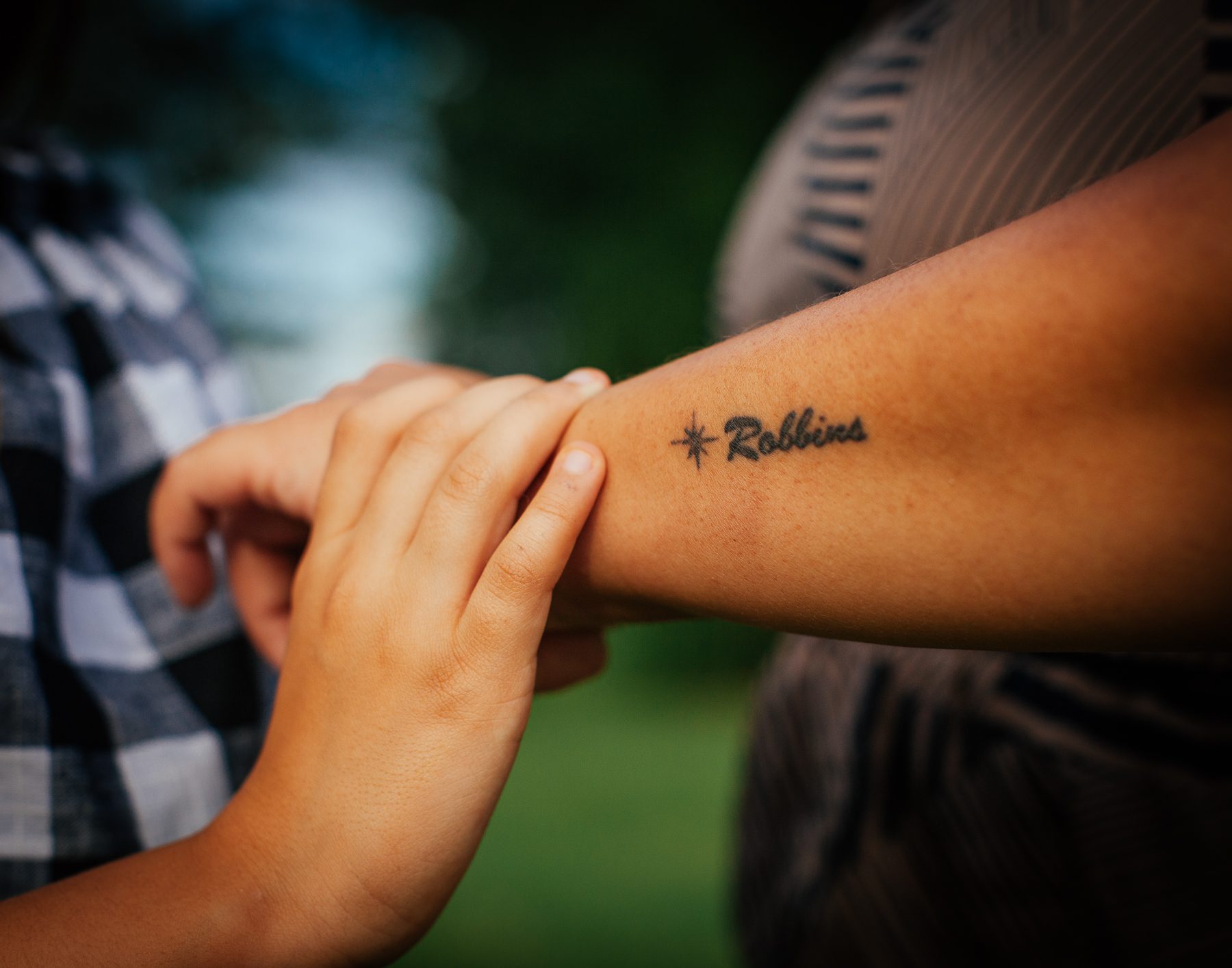 Michelle’s tattoo of the North Star represents what guided her ancestors and many others north to Canada — “the promised land.”  “Robbins,” Michelle’s last name, is the name of her ancestor’s “master.”