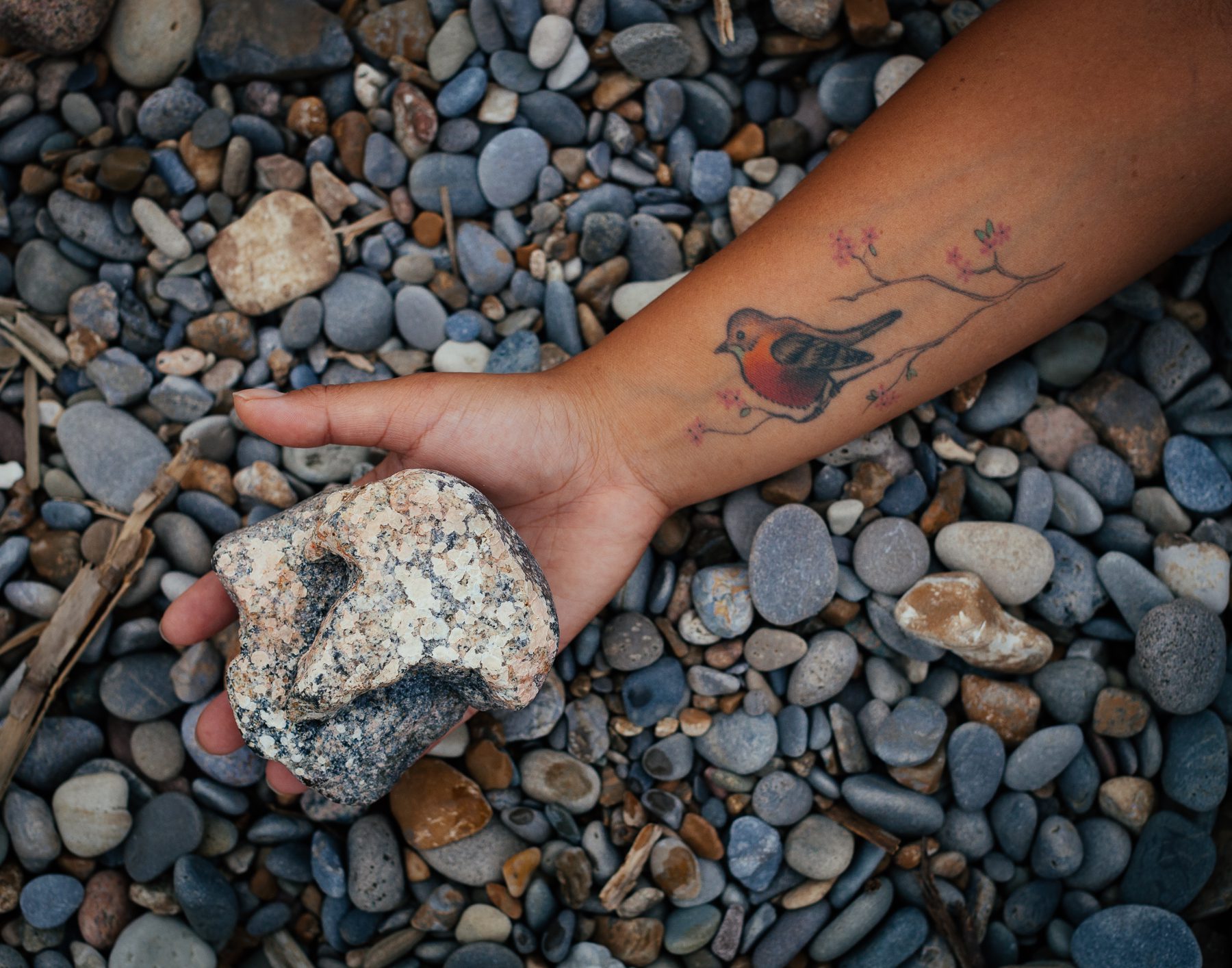 Robin holding a rock she collected on the beach in Bataan.