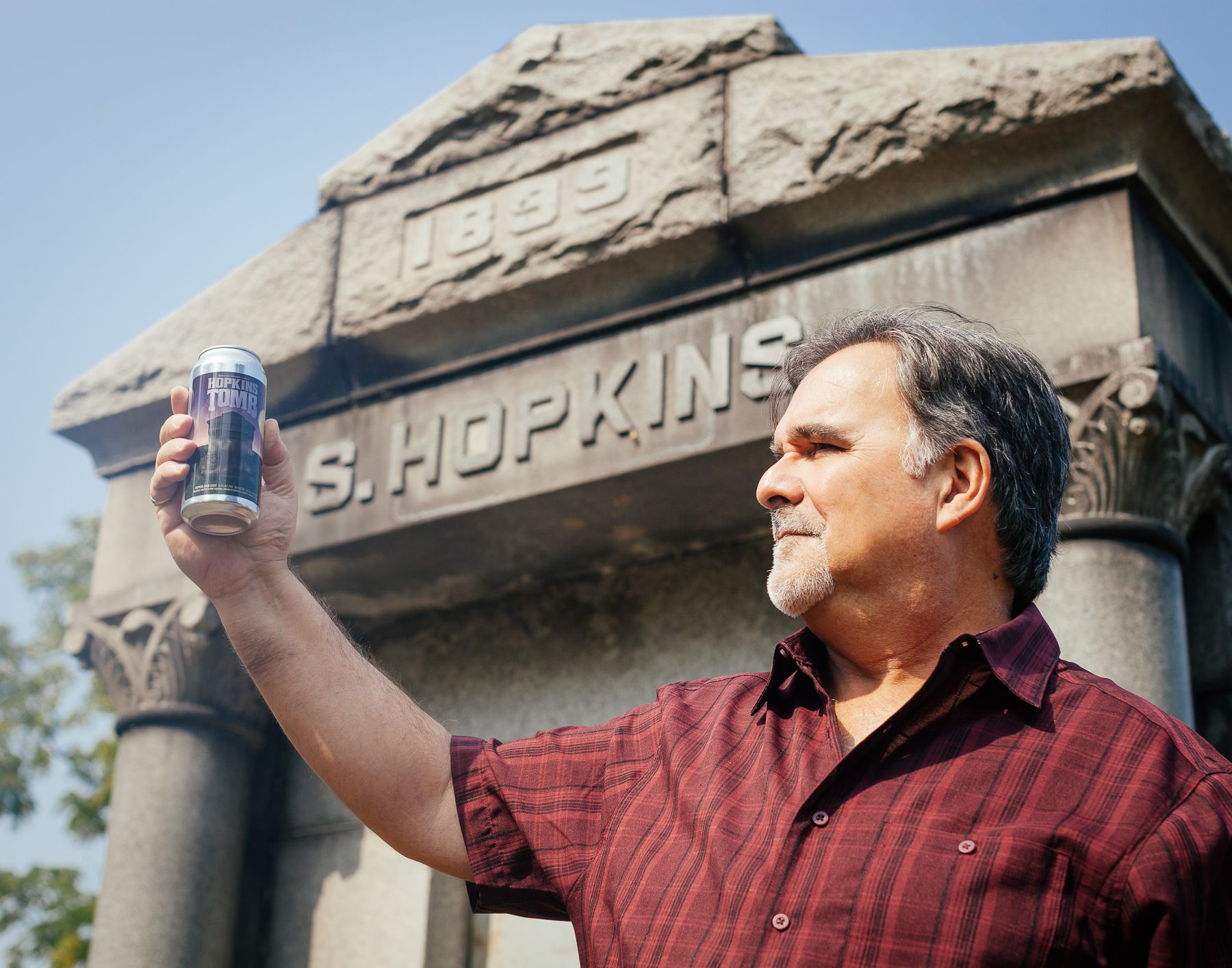 Samuel Hopkins was a local business person in Port Colborne, who “went boom and bust a few times.” The legend is that he was highly concerned about his legacy and wanted to make sure he had the cemetery’s most immense tomb. Samuel died before the tomb’s completion. So, his body waited in a regular burial for seven or eight years for its final resting place. Once they finished building the grave, his remains were exhumed and moved there. Local lore is that his spirit is not really in the tomb anymore. For this reason, it is a Halloween tradition for the area’s youth to visit at night, knock on the door and run around the tomb. 