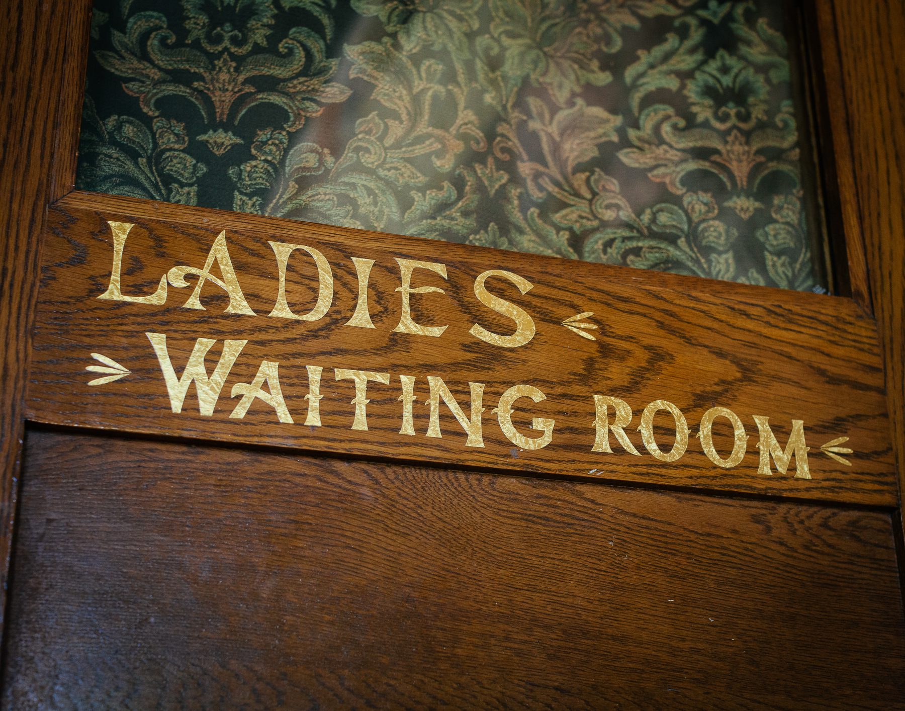 An original door of the Kingsville station reading “Ladies Waiting Room”.