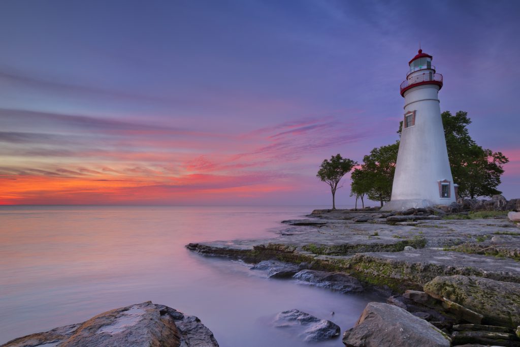 Picture of a lighthouse at sunset on the shore of Lake Erie