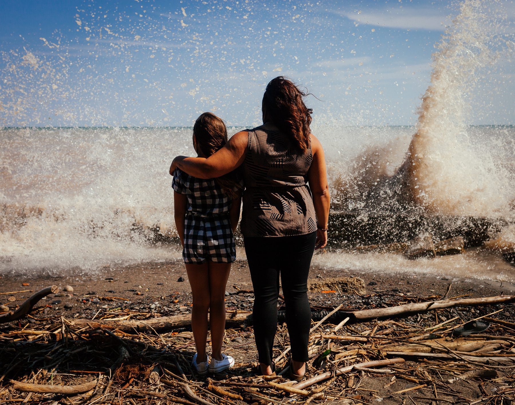 On both sides of Michelle's family, her ancestors migrated to Canada to escape slavery in the United States. Looking out over Lake Erie Michelle reflects on those who lost their lives as they tried to cross the lake and find safety and freedom. (Story and image by Colin Boyd Shafer)