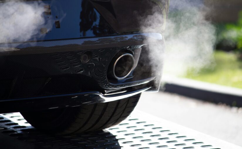 car with polluting emissions coming out of tailpipe