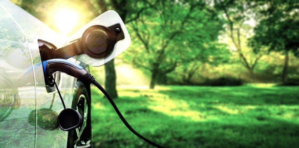 EV charging with trees in background